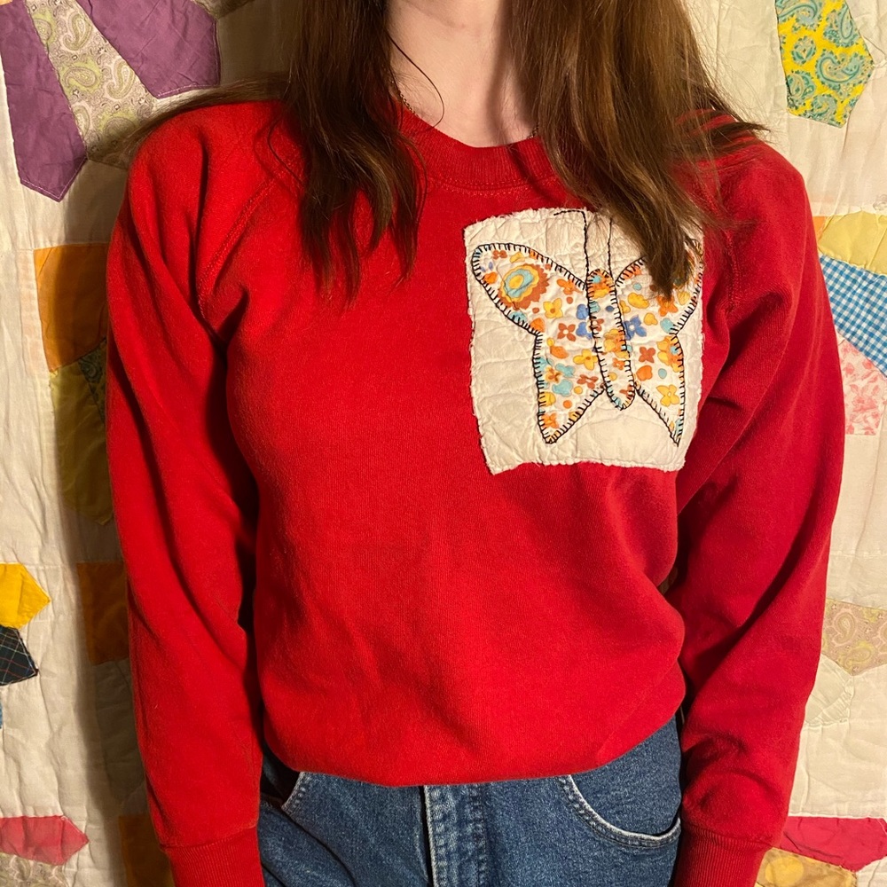 Altered red crewneck with vintage quilted butterfly pocket 🦋